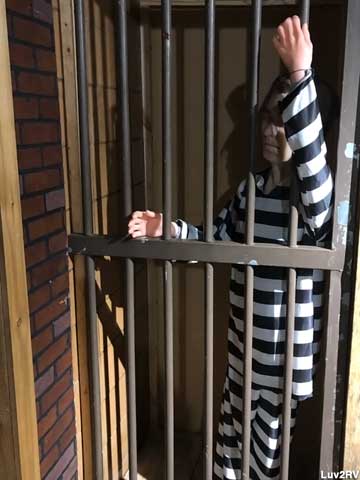 Jail cell scene.