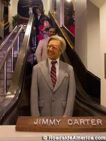 President Carter on the escalator.