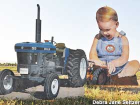 Giant baby and tractor.