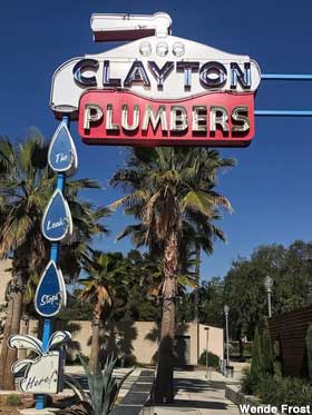 Clayton Plumbers sign.