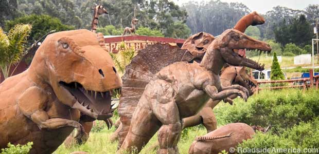 Rusting scrap metal dinosaurs.