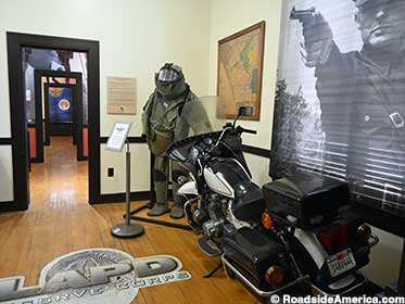 LAPD motorcycle and bomb disposal suit.