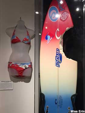Bethany's bathing suit and surfboard.