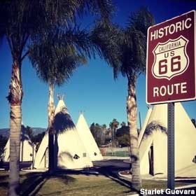 Wigwams and Route 66 sign.