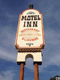 Motel Inn sign.