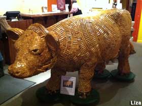 Cow made of wine bottle corks.