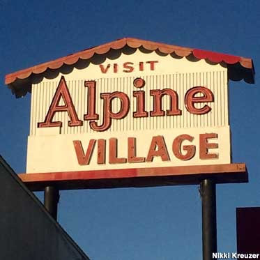 Visit Alpine Village sign.