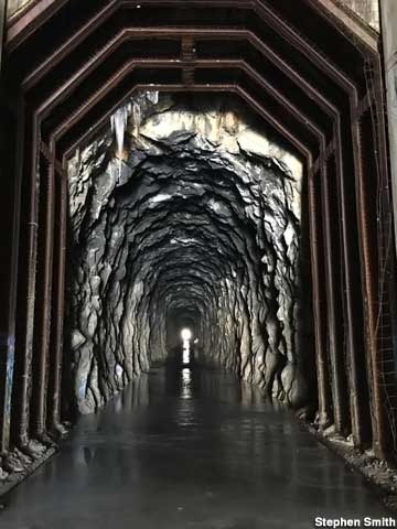 Railroad tunnel with ice.