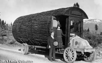 Log vehicle in vintage photo.