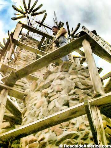 Jim Bishop climbs the tower.