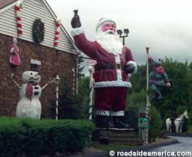 Snowman, Santa and elf greet you.