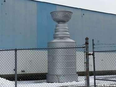 Large Stanley Cup replica.