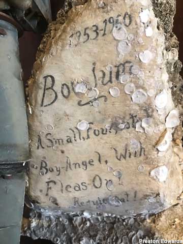 Gravestone made by hermit Roy Ozmer for his dog, Boogum.