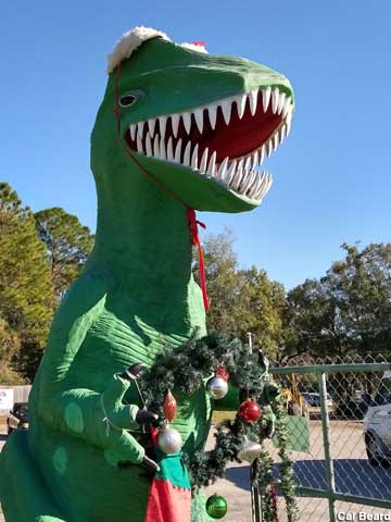 T.rex in holiday attire.