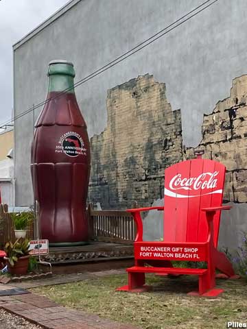 Big coke bottle and photo op chair.