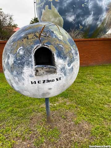 Globe mailbox.