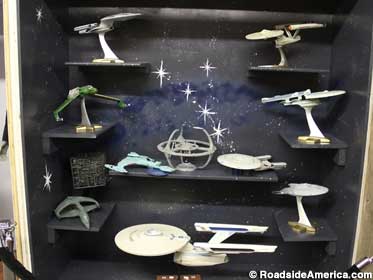A crowded universe of Star Trek ship models.