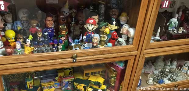Cabinets filled with collectibles.
