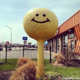 Miniature smiley water tower.