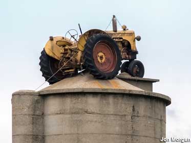 Tractor on a Silo.