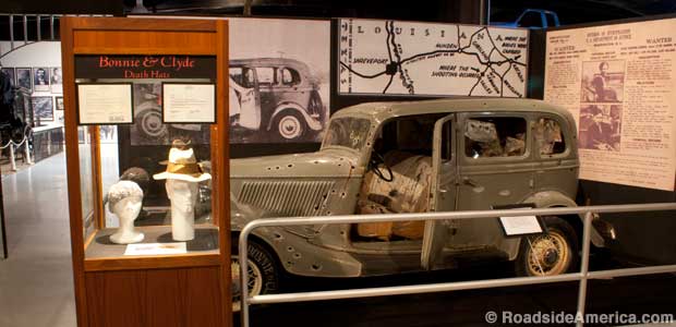 Bonnie and Clyde hats and death car replica.