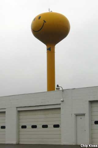 Smiley Face Water Tower with a bow tie.