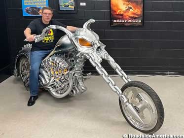 Astride Nicolas Cage's Hellcycle from Ghost Rider.
