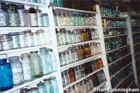 Shelves of fabulous vintage fruit jars.