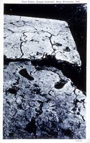Vintage postcard of the angel's footprints in stone.