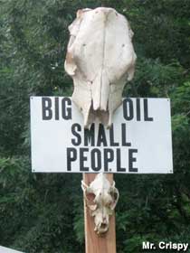 Big oil, small people.