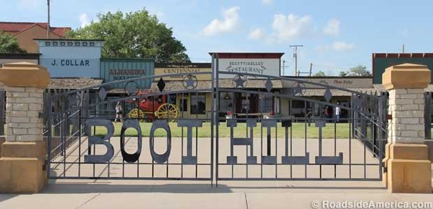 Fake Wild West town beckons behind Boot Hill gates.