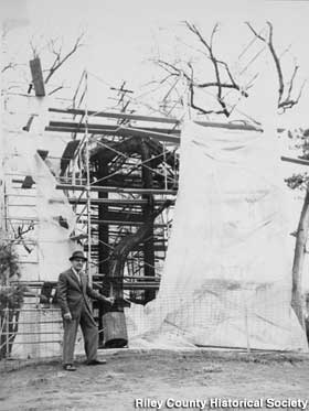 George Filinger next to the statue under construction.