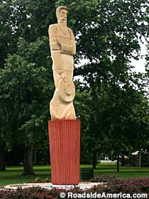 Tall Mennonite statue.