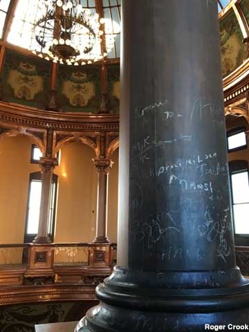Early 20th century graffiti, scrawled on the dome's support columns.