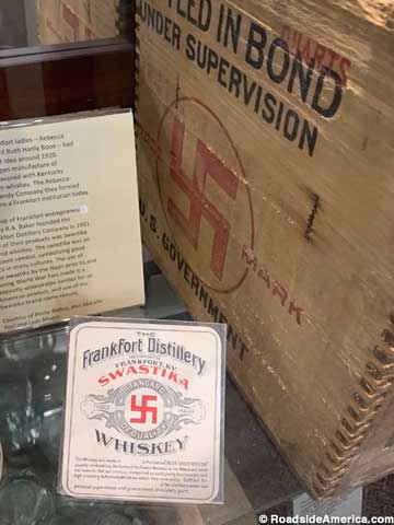Label and wooden case of Swastika brand whiskey,