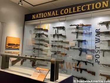 America's national collection of machine guns. In front, the world's first bazooka.
