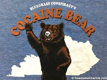 Despite this white-nosed illustration, Cocaine Bear did not snort drugs. It ate them.