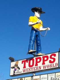 On top of Topps sign.