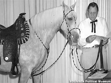 Old photo of Governor Jimmie Davis on the day he rode his horse into his office.