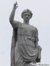 Statue at the top of the monument.