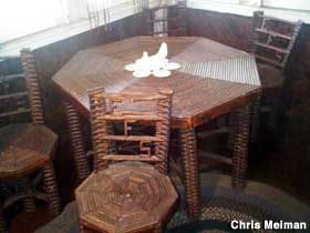 Table and chairs in the Paper House.