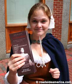 Cry Innocent puritan hands out flyers.