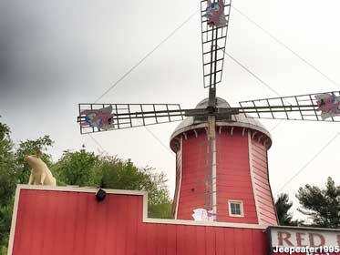 Windmill with pigs.