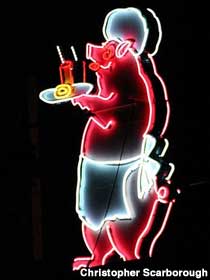 Neon pig sign.