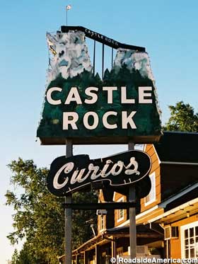 Castle Rock Curios sign.
