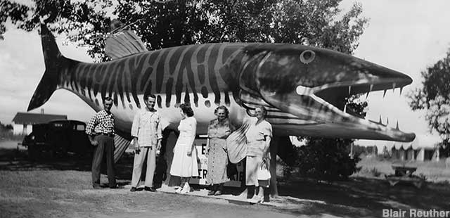 The Kaland family poses with the Tiger Muskie soon after its arrival.
