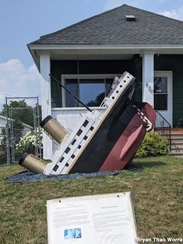Titanic sinks on a front lawn.