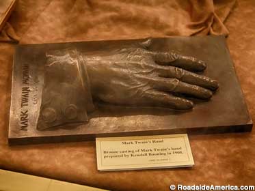 Twain's writing hand in carbonite? No, bronze.