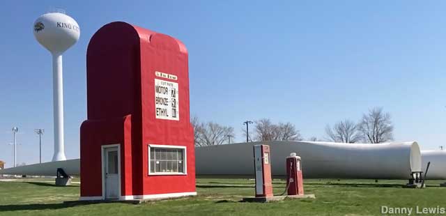 The Big Pump and its bigger neighbors: the town water tower and giant wind turbine blades.