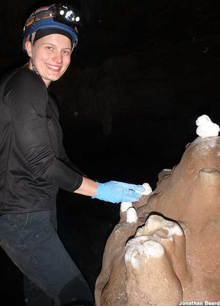 Sarah at work restoring stalagmites.